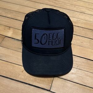 50 EGG Music Trucker Hat